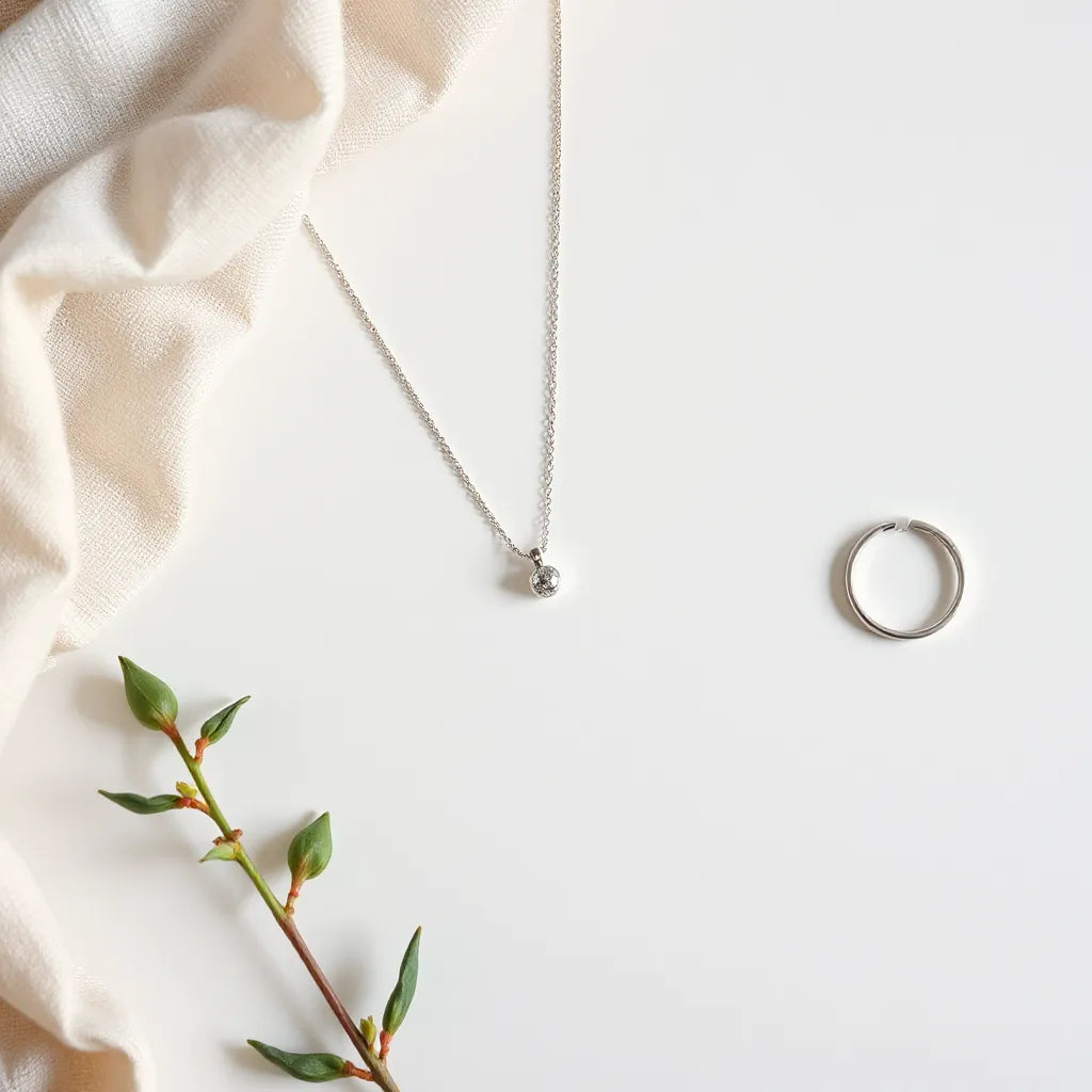 Assorted 925 sterling silver necklace, earrings, bracelet, and ring arranged neatly on a neutral background