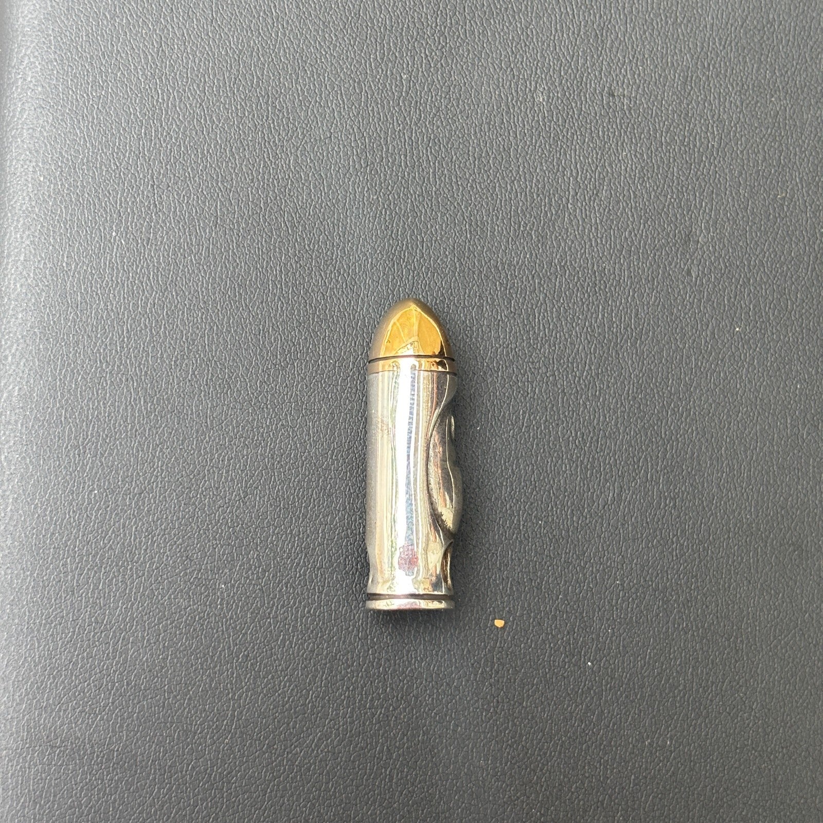 Colgante de bala con calavera en plata de ley 925